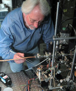 a scientist studying fusion reactions